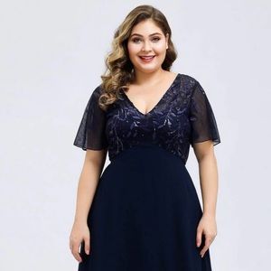 Navy formal gown. Fits well. Worn once